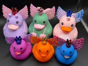 Limited Edition Angel Narwhal, Mermaid & Pixie Ducks – 2.25” with Iridescent Wings, Metallic Crown, Custom Tags, Magnet or Suction Cup Base
